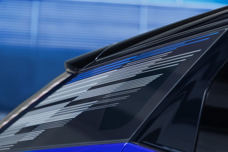 Close-up of the Modern Pattern on the 2026 OPTIQ-V Rear Quarter Glass | Schwan Buick GMC in Mandan ND