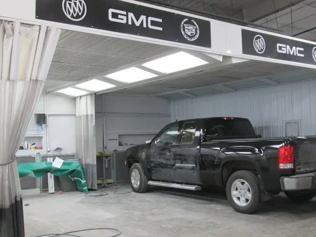 black truck parked in a warehouse